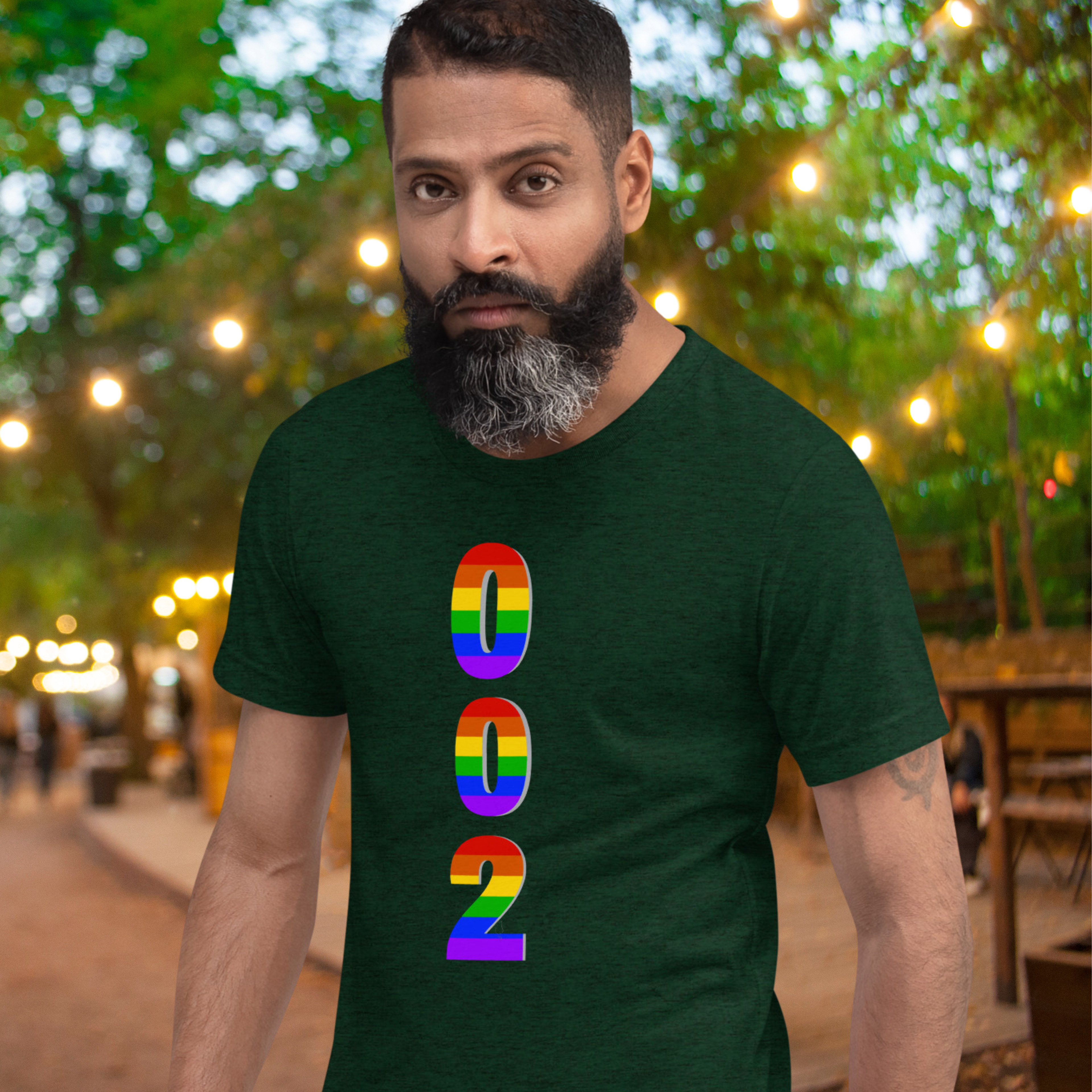 Unisex Pickleball Pride T-Shirt by PeaMac Pickleball Tees featuring rainbow LGBTQ2 design on the back.