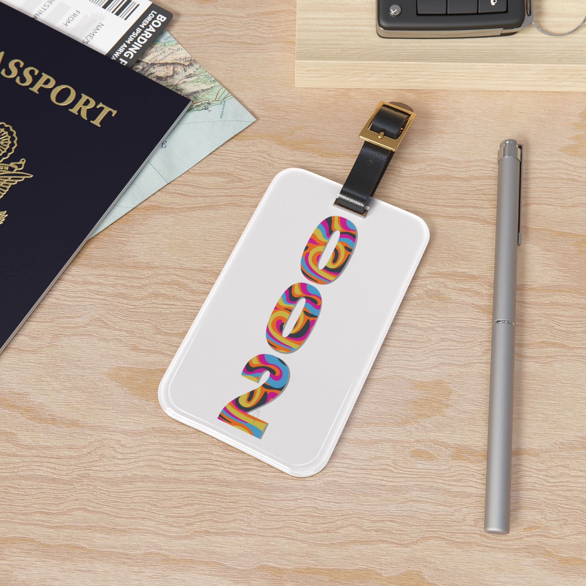 Pickleball luggage tag with retro numbers design, PeaMac Tees accessory, featuring vibrant colors and durable material.