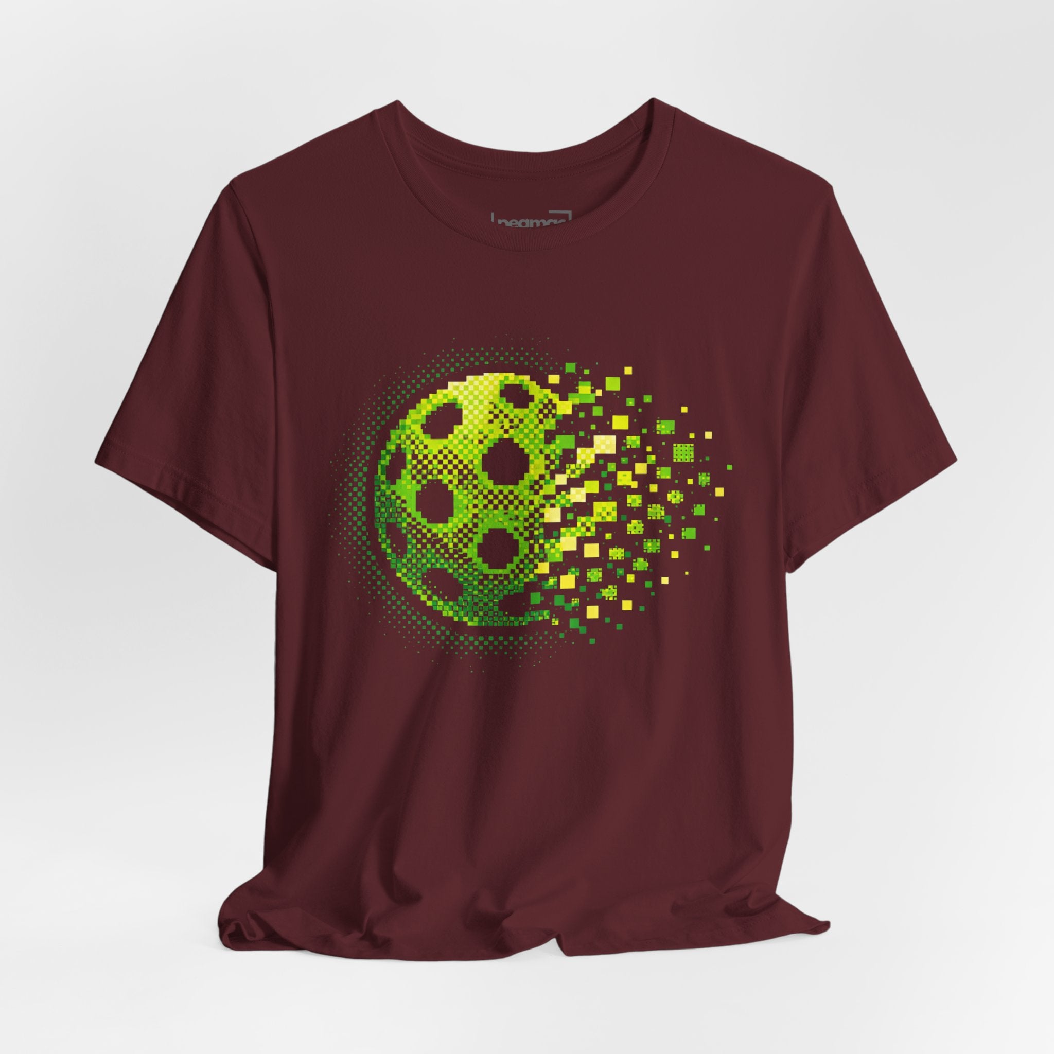 Green Pixelated Pickleball Tee with retro court graphic, casual T-shirt by Printify, featuring colorful pickleball design.