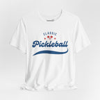 Classic Pickleball Script T-Shirt featuring red and blue paddle and ball design, comfortable cotton fabric, casual sportswear.