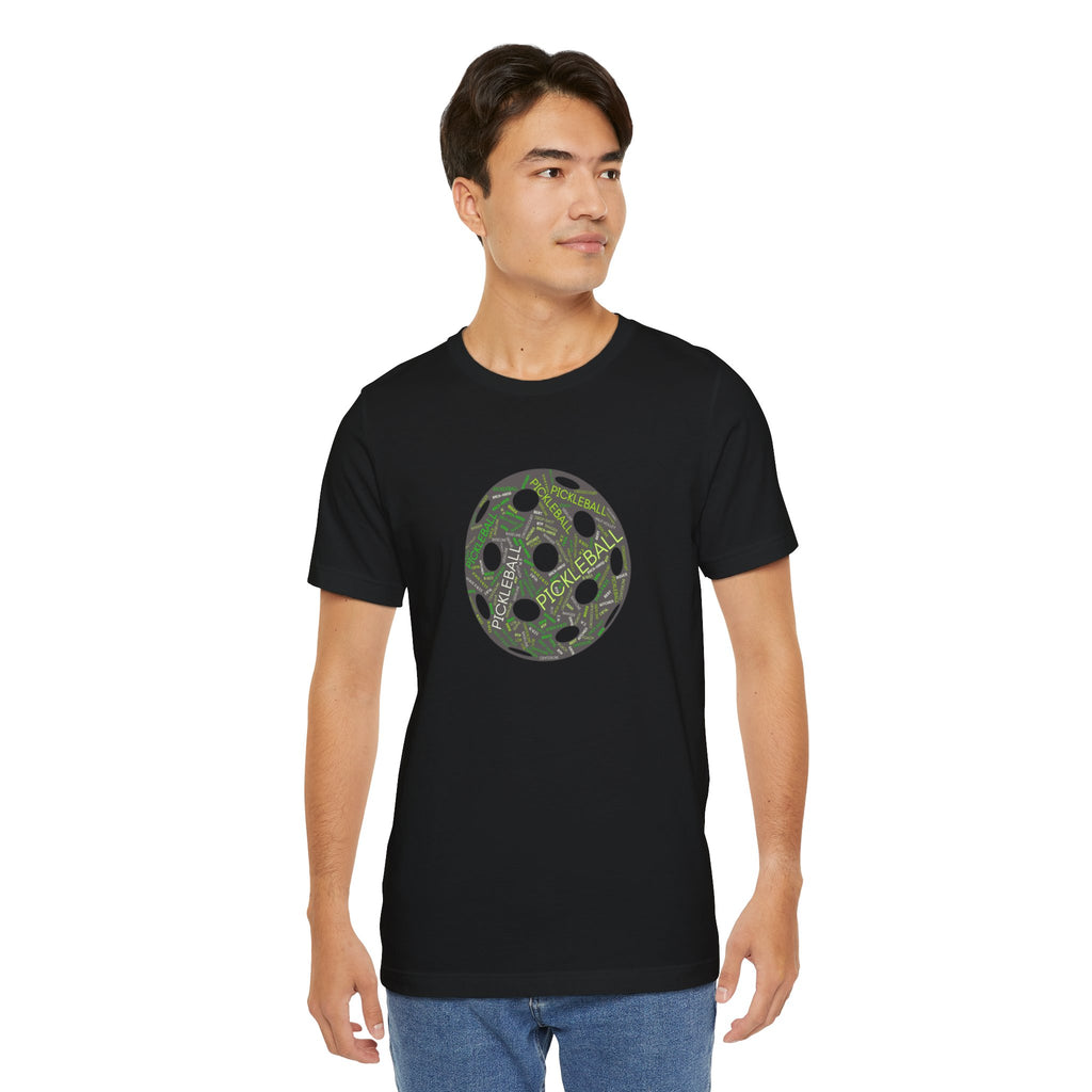 Pickleball Word Cloud T-shirt with pickleball-shaped graphic, featuring words like dink, pickle, and kitchen, by Printify.