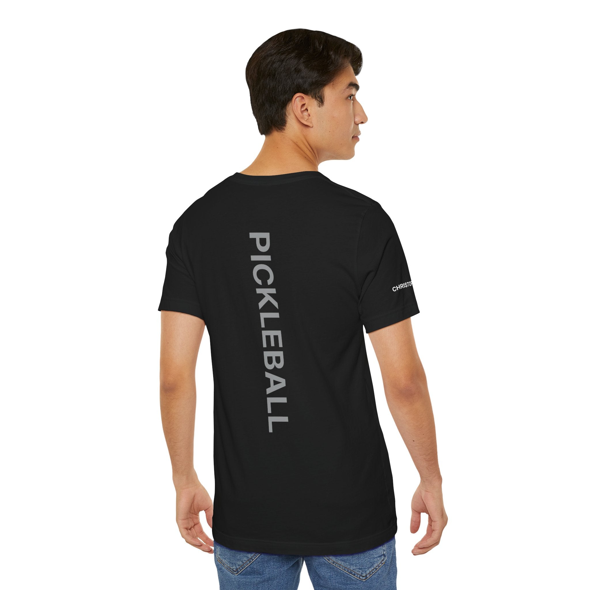 Personalized pickleball T-shirt by Printify with custom name on sleeve and club logo on the back, featuring a pickleball design.