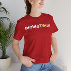 Toronto PickleTOwn T-Shirt featuring CN Tower and pickleball design, casual unisex apparel by Printify.