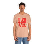 Red LOVE Pickleball graphic T-shirt by Printify featuring bold pop art design on a casual cotton tee.