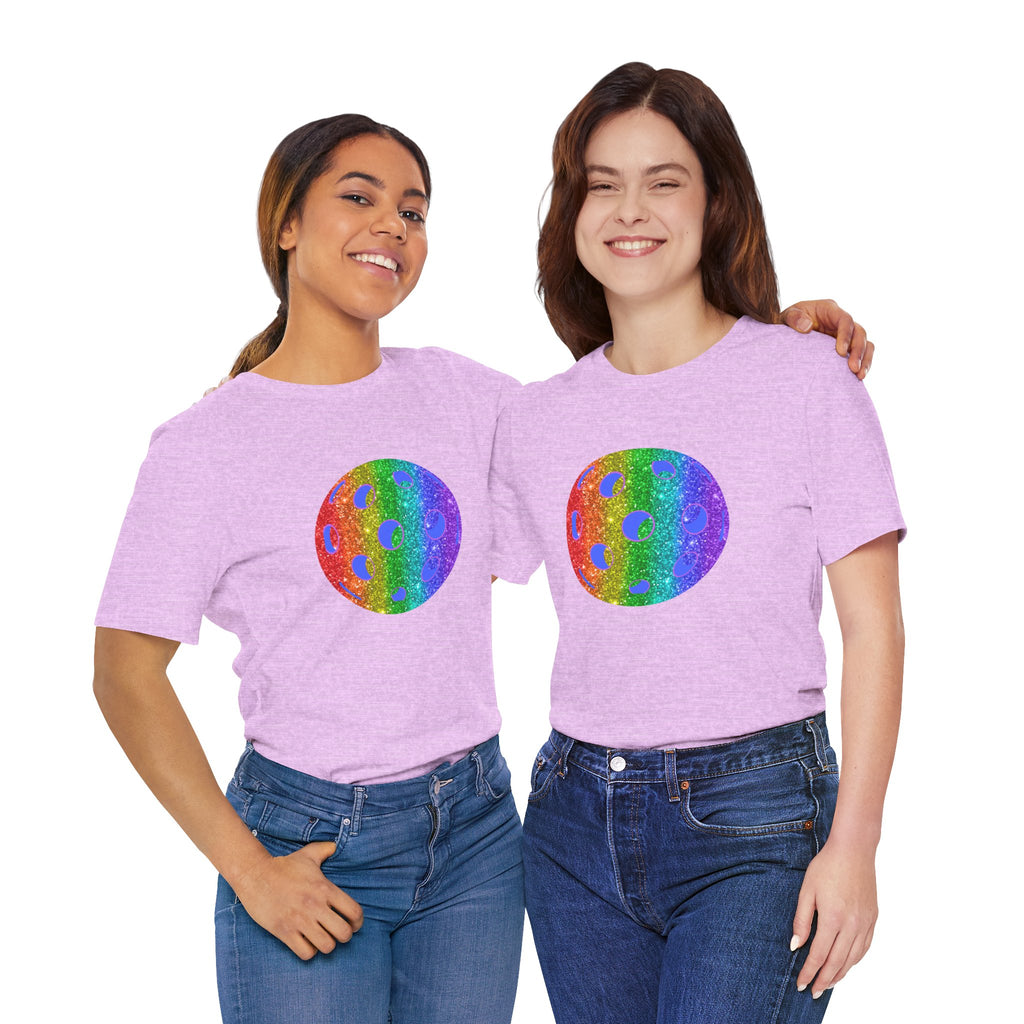 Rainbow glitter pickleball pride T-shirt by Printify featuring bold "Loud and Proud" text and colorful pickleball graphics.