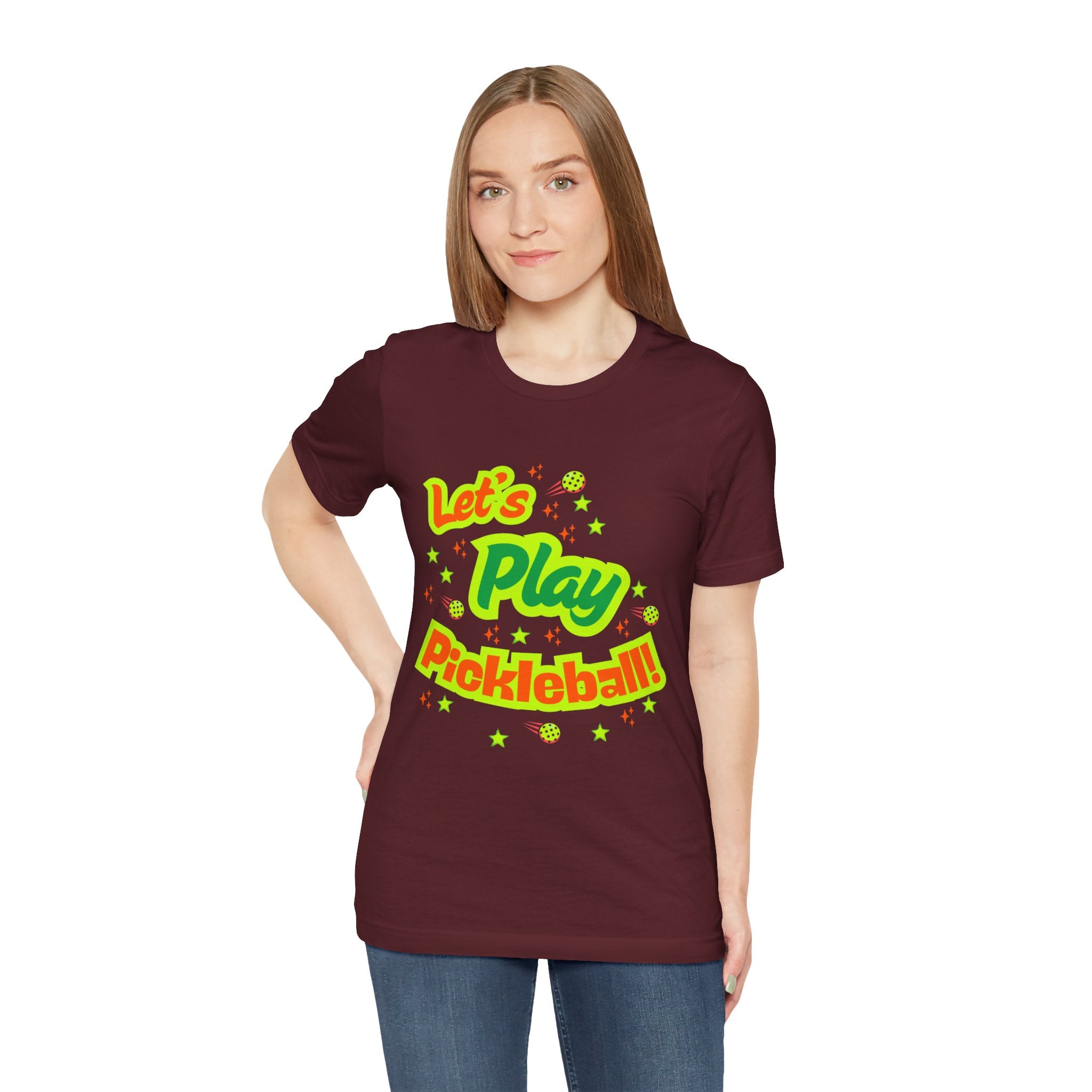 Neon orange and electric green pickleball rally tee with court graphic, stylish T-shirt by Printify, perfect for activewear.
