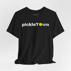 Toronto PickleTOwn T-Shirt featuring the CN Tower and Pickleball 'O' logo, casual graphic tee by Printify.