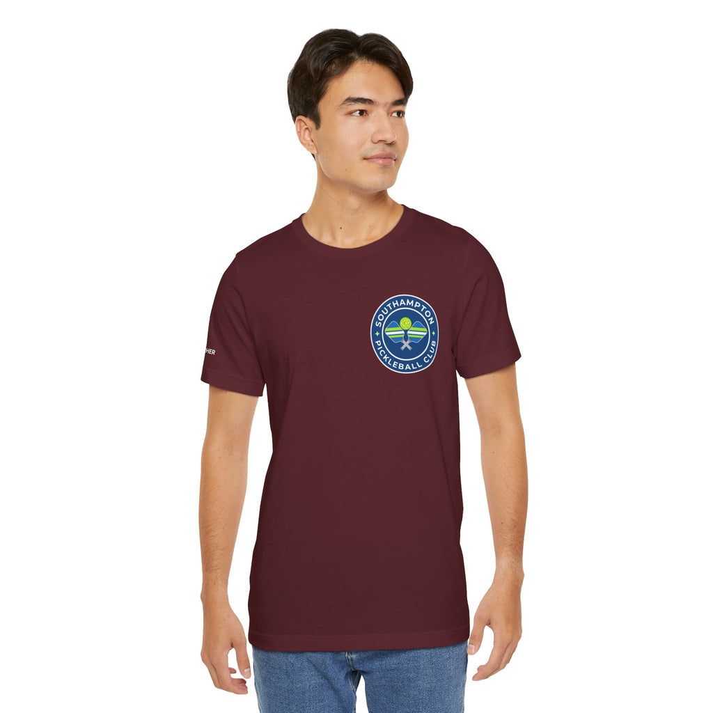 Personalized pickleball T-shirt with custom name sleeve and club logo on the back, featuring a central pickleball graphic.