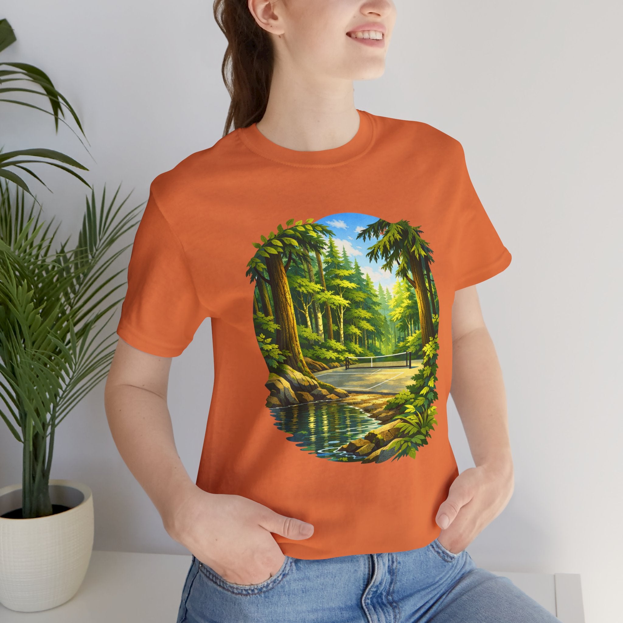 Hidden Forest Pickleball T-Shirt featuring Bainbridge Island tribute, unisex design, printed by Printify, showcasing the graphic on front.