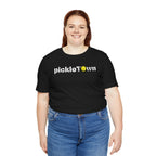 Toronto PickleTOwn T-Shirt featuring CN Tower and pickleball design, showcasing a stylish 6ix-themed graphic on a casual tee.
