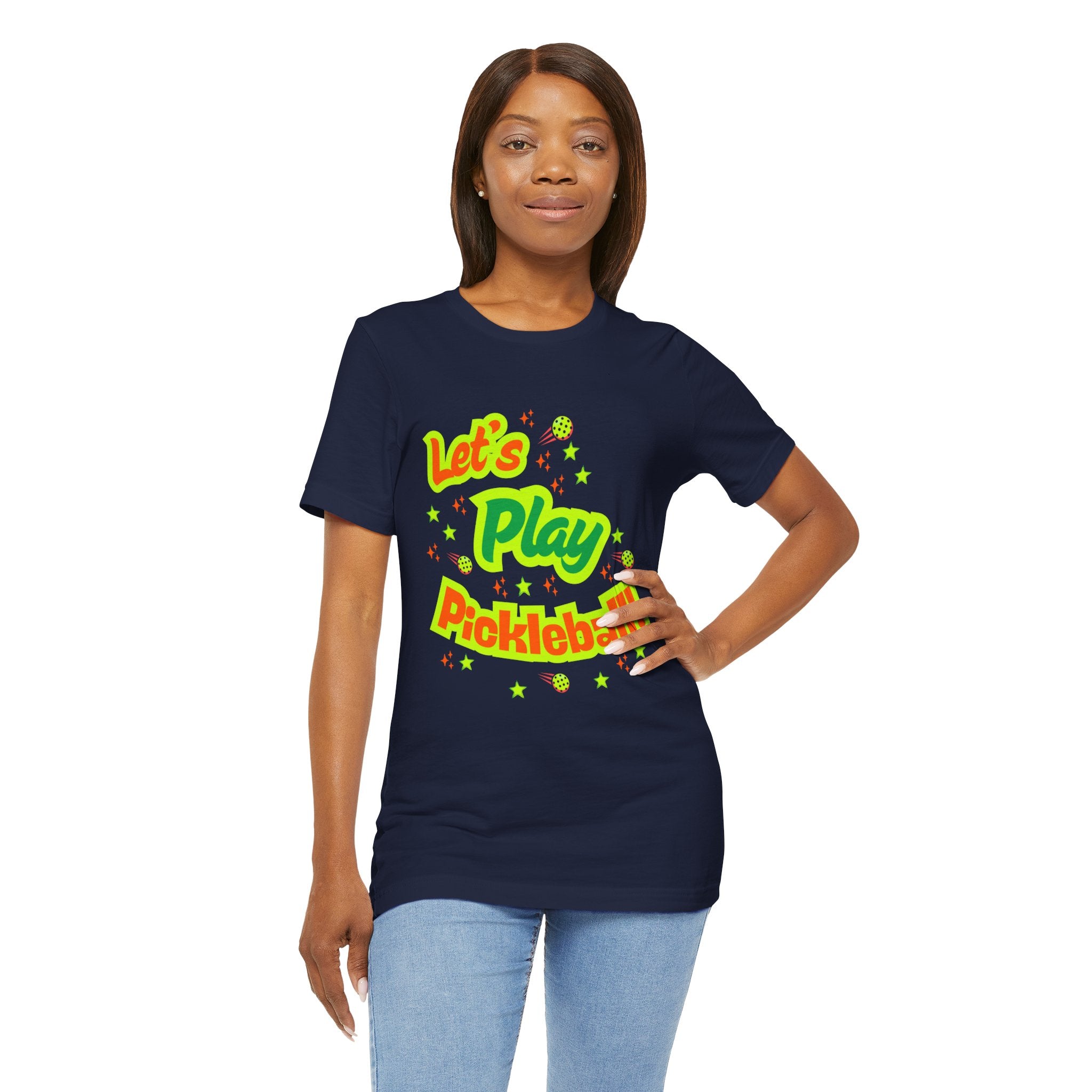 Neon orange and electric green pickleball rally T-shirt with court graphic, featuring bold colors and sporty design by Printify.