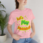 Neon orange and electric green pickleball rally T-shirt with court graphic by Printify, casual athletic wear for sports enthusiasts.