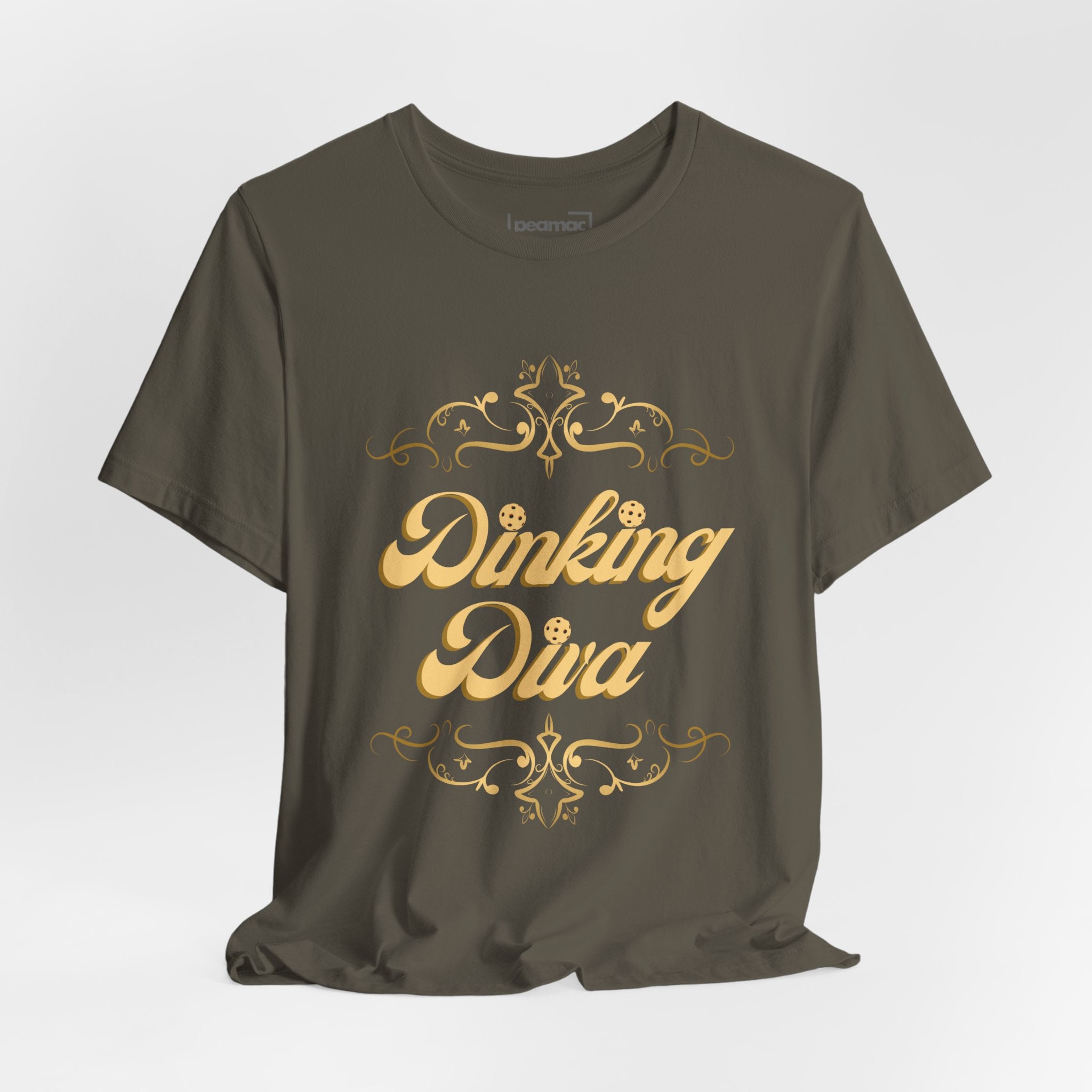 Dinking Diva Pickleball T-shirt in gold filigree design, casual fit, white fabric, perfect for pickleball enthusiasts.