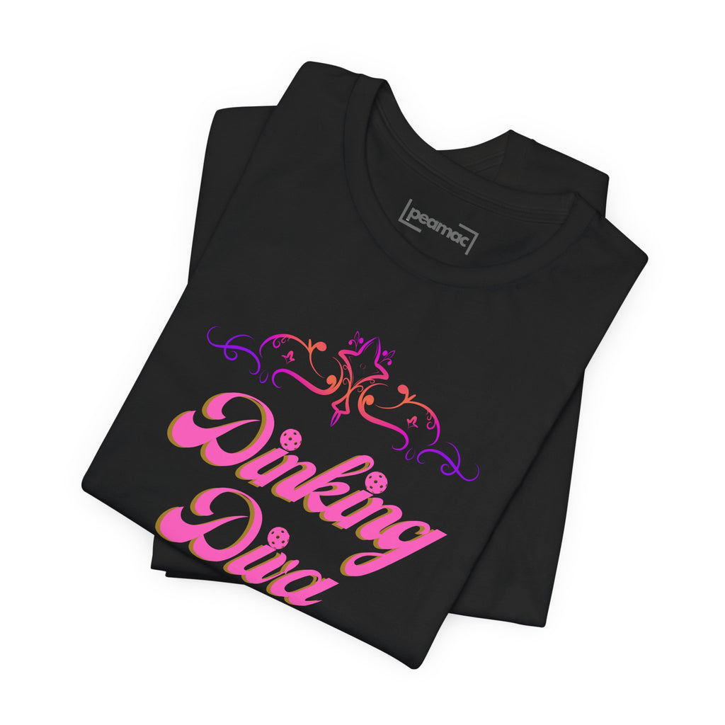 Pink Dinking Diva pickleball T-shirt with filigree design, athletic fit, and printed logo on front, stylish and comfortable for active wear.