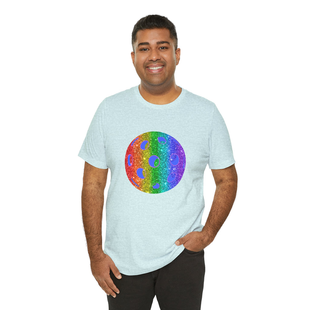Rainbow glitter pickleball pride T-shirt with "Sparkle Loud and Proud" slogan, designed for LGBTQ+ support and vibrant style.