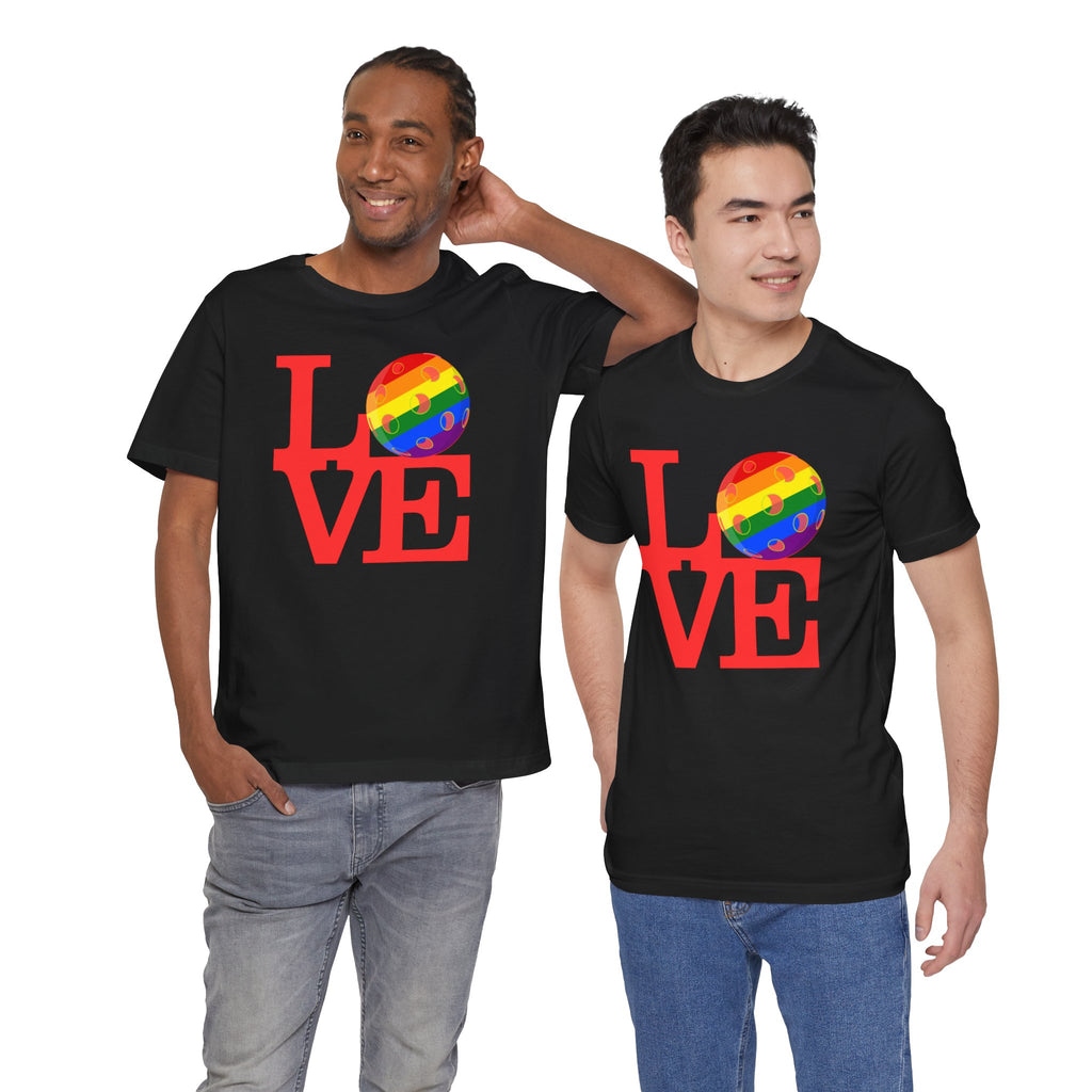 Rainbow LGBTQ2 Pride T-shirt by Printify featuring a colorful "LOVE" pickleball design on a comfortable cotton tee.