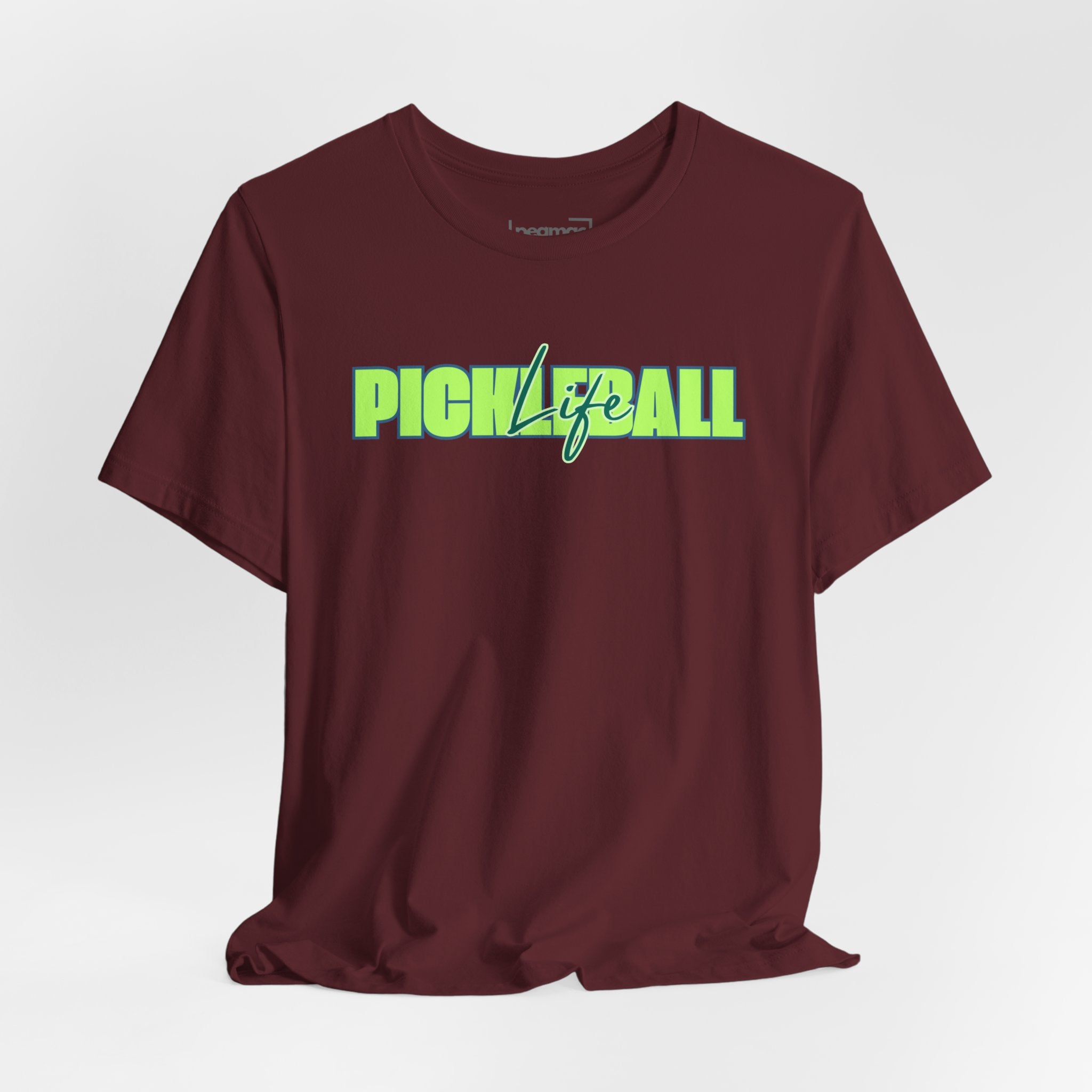 Unisex Pickleball Life graphic T-shirt in bold green and blue with colorful pickleball design, made by Printify.