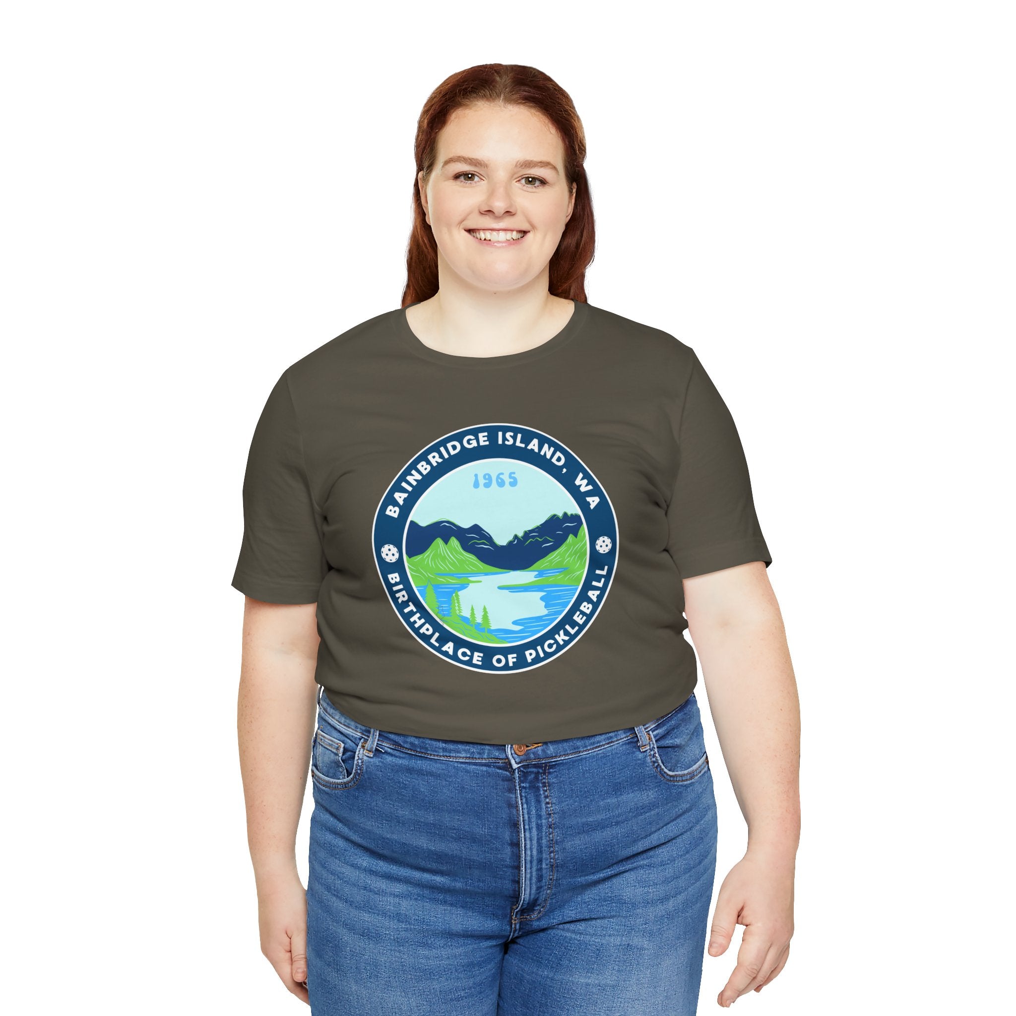 Unisex Bainbridge Island Pickleball T-Shirt featuring "Birthplace of Pickleball 1965" logo, casual cotton tee for pickleball fans.