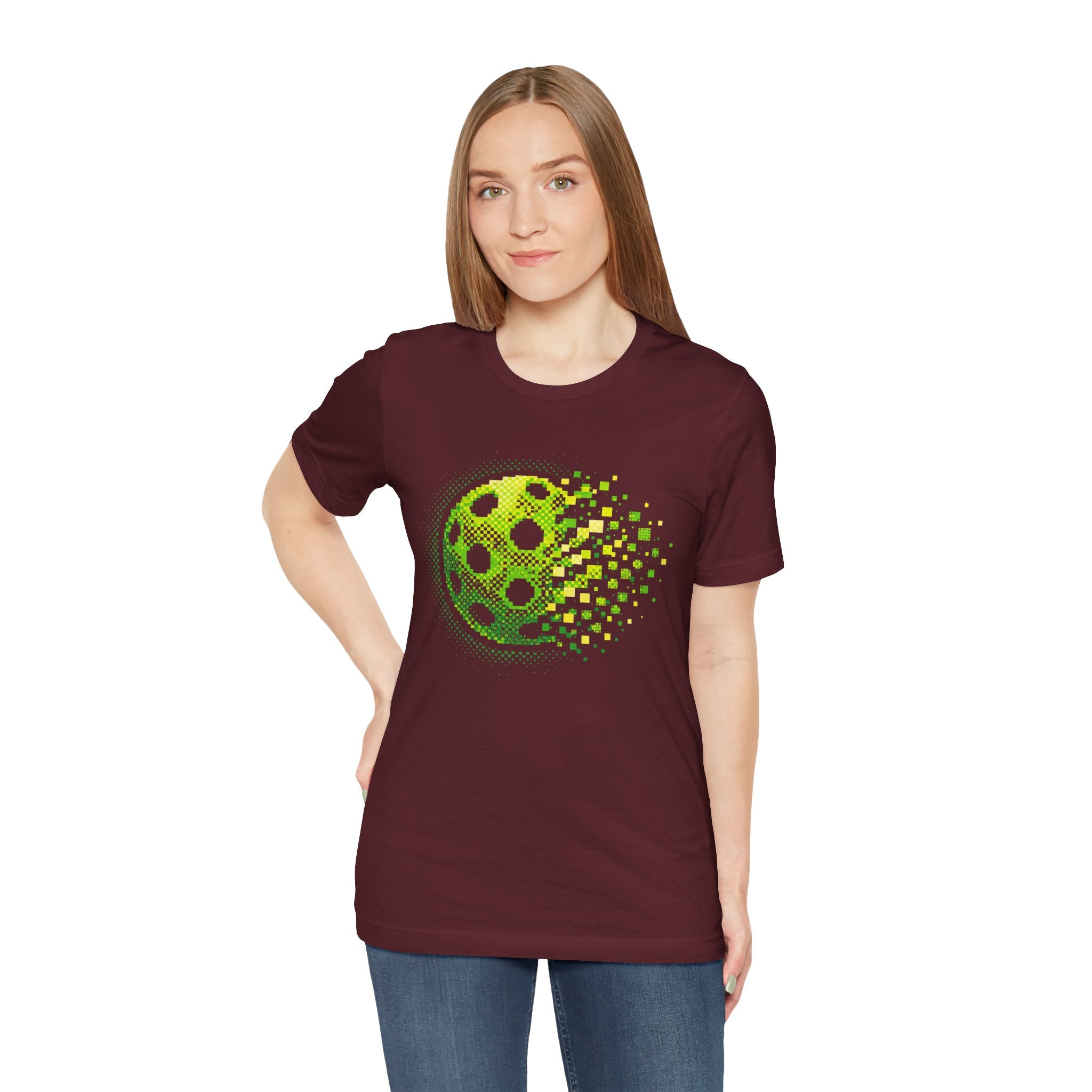 Green Pixelated Pickleball Tee with retro court graphic, casual T-shirt by Printify, featuring a colorful pickleball design.