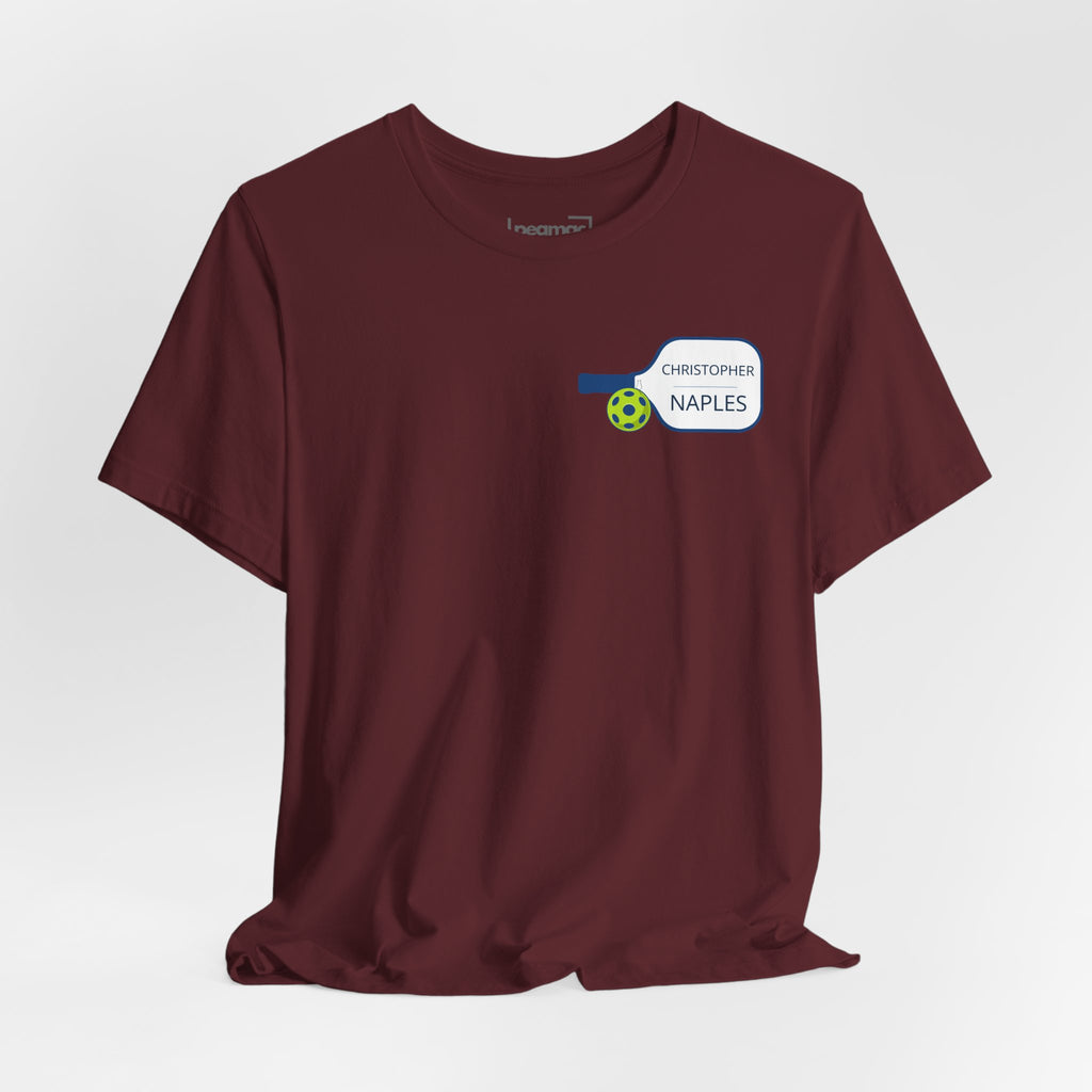 Personalized pickleball T-shirt by Printify featuring custom name and club on paddle graphic design.