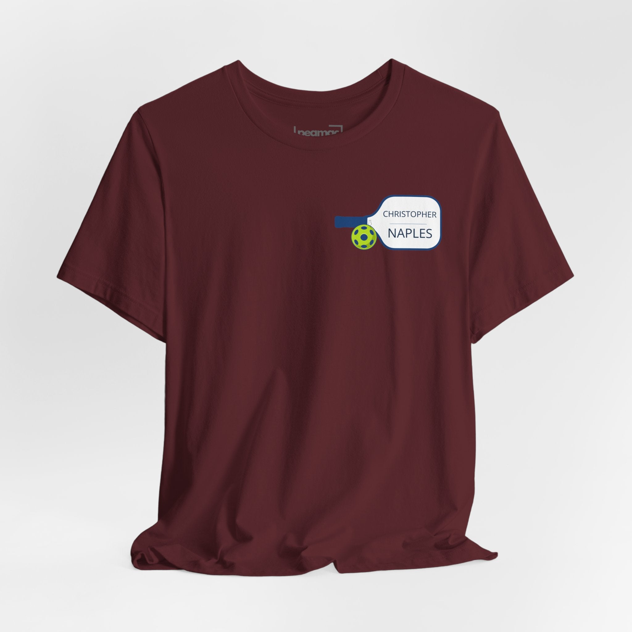 Personalized pickleball T-shirt by Printify featuring custom name and club on paddle graphic design.