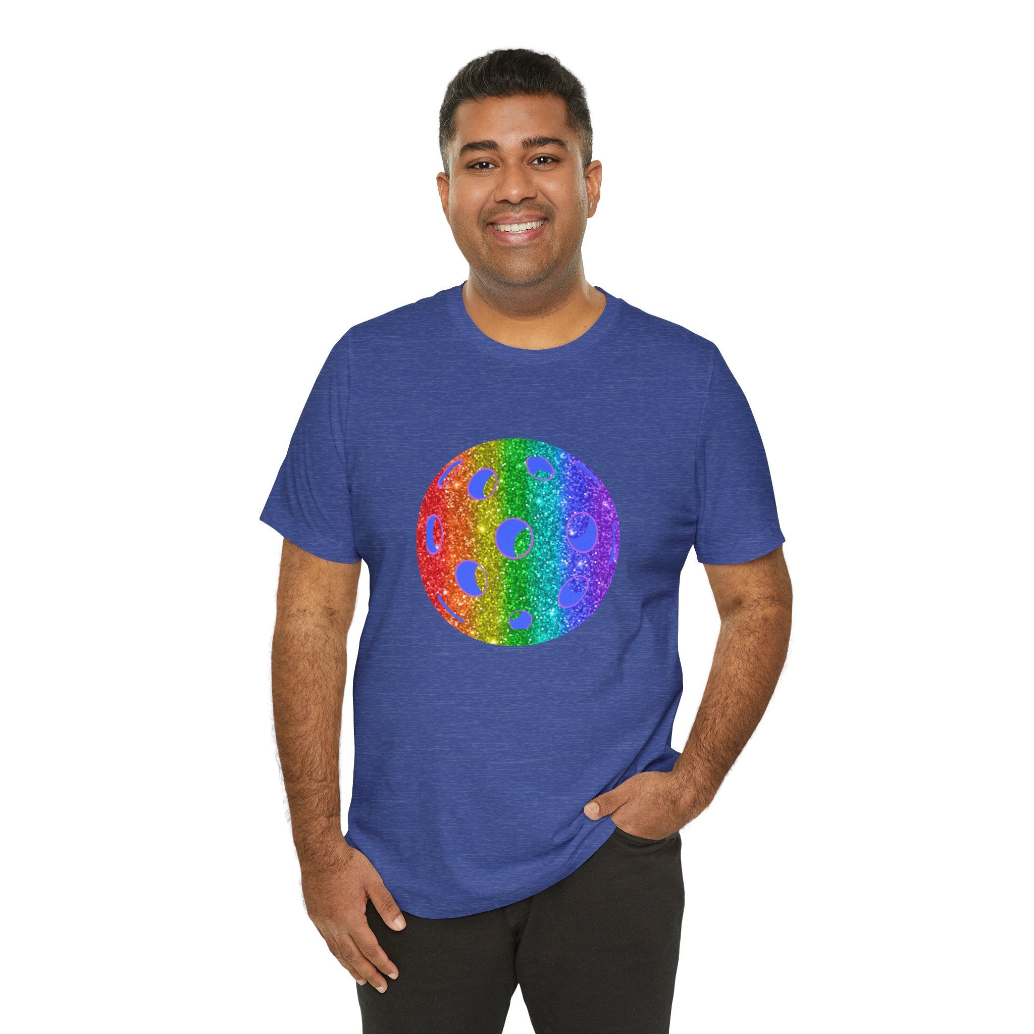 Rainbow glitter pickleball pride T-shirt by Printify featuring colorful pride flag design and bold "Loud and Proud" message.