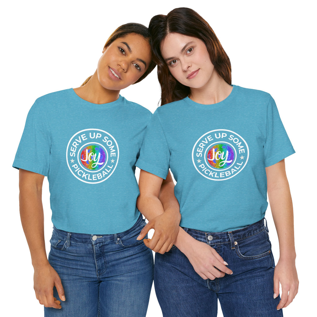 LGBTQ2 pride pickleball T-shirt by Printify featuring colorful rainbow design and bold "Serve Up Some Joy" message.