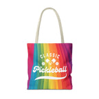 Rainbow tote bag with crossed pickleball paddles and script design, featuring vibrant colors and spacious storage from Printify.