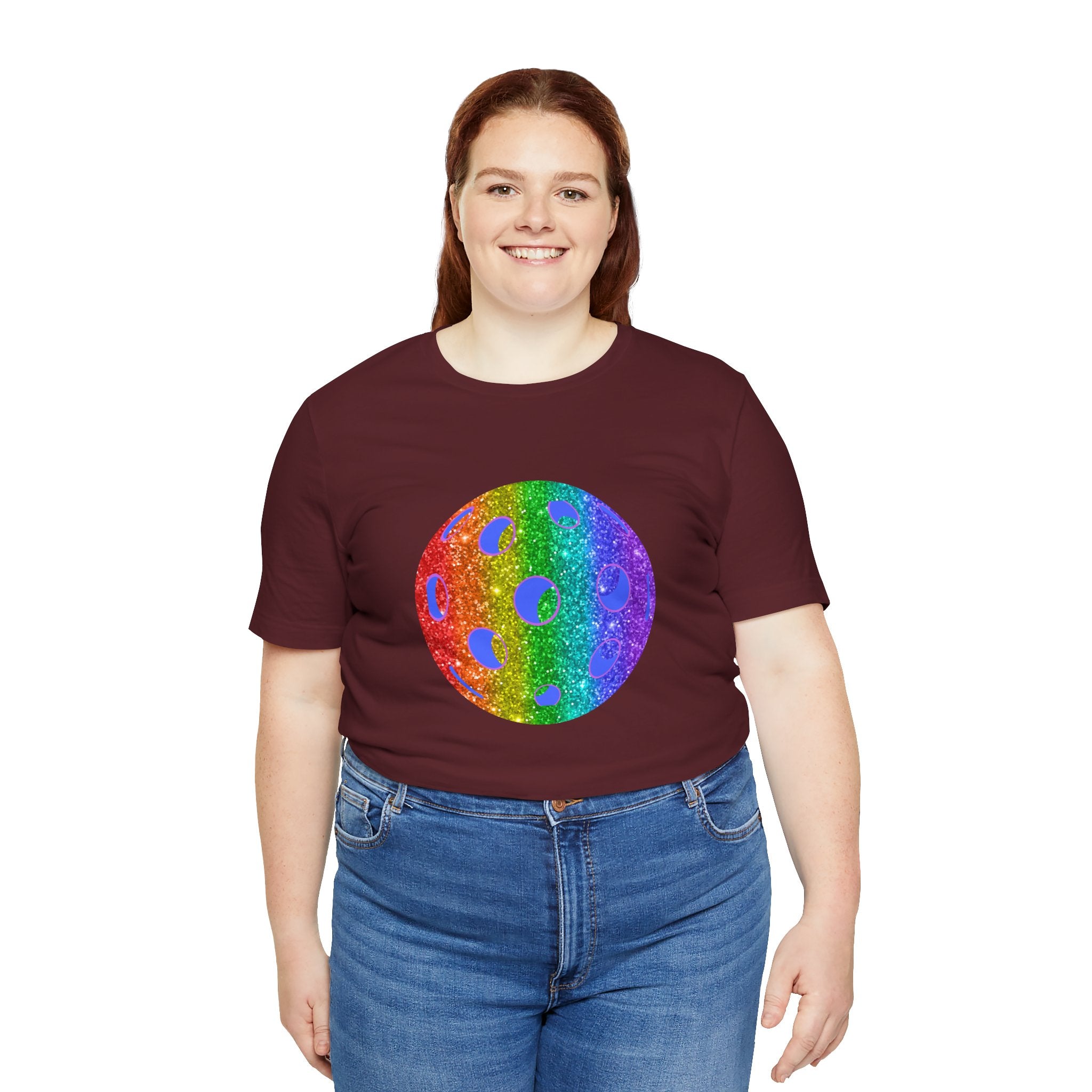 Rainbow glitter pickleball pride T-shirt by Printify featuring bold colors and a festive design for pickleball enthusiasts.
