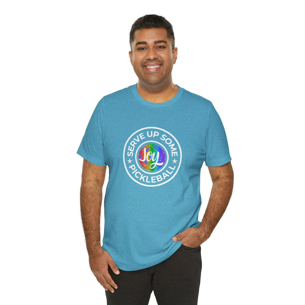 LGBTQ2 pride T-shirt from Printify featuring colorful pickleball graphics and the phrase "Serve Up Some Pickleball Joy."