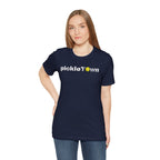 Toronto PickleTOwn T-Shirt by Printify featuring CN Tower and Pickleball ‘O’ design on a casual T-shirt.