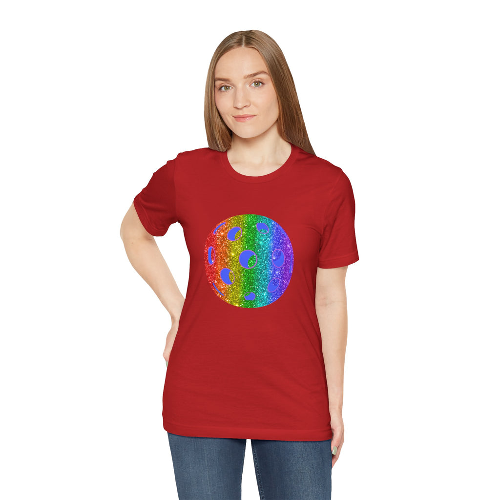 Rainbow glitter pickleball pride T-shirt featuring the Sparkle Loud and Proud Pickleball logo on a colorful, festive shirt.