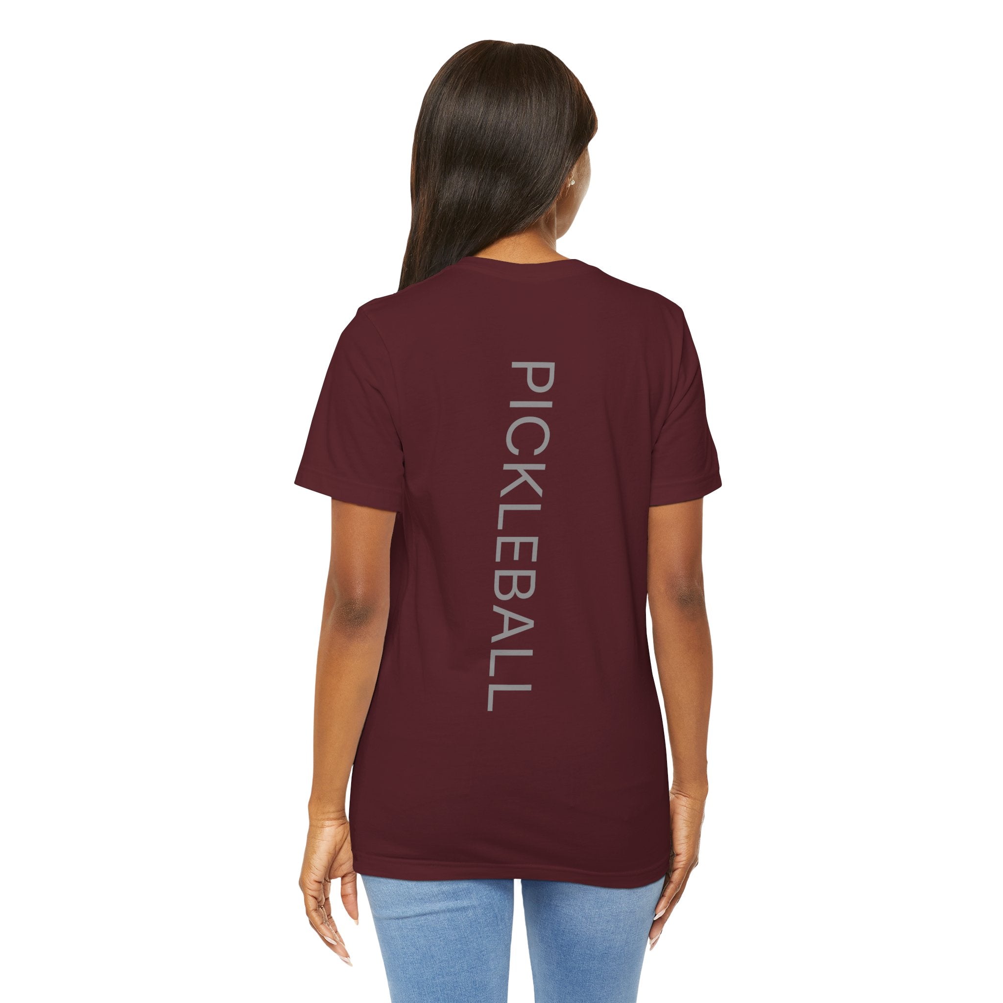 Personalized pickleball T-shirt with custom name and club on a paddle graphic, by Printify, featuring vibrant design and comfortable fit.