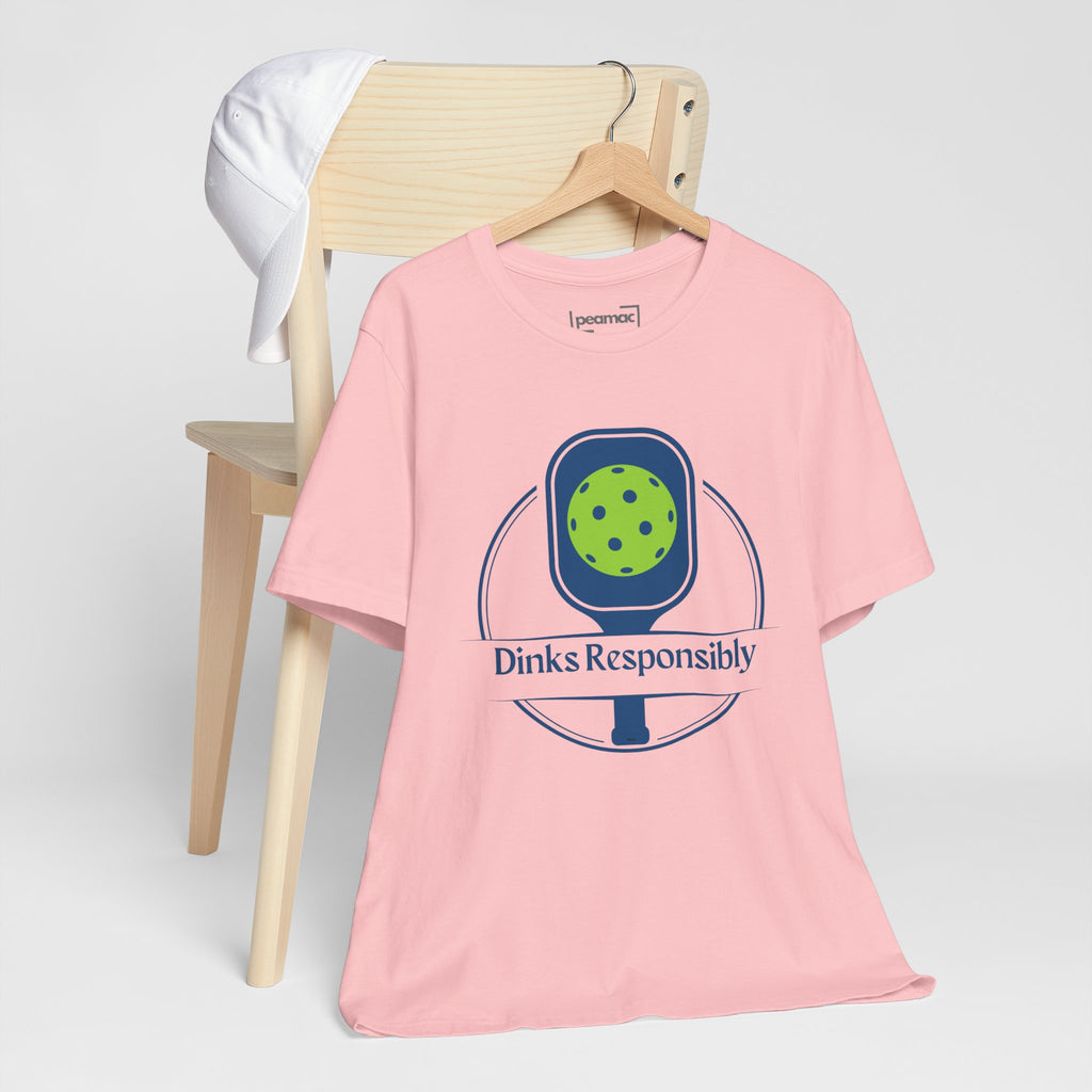 Dinks Responsibly pickleball T-shirt with paddle and ball graphic, featuring humorous pickleball-themed design by Printify.