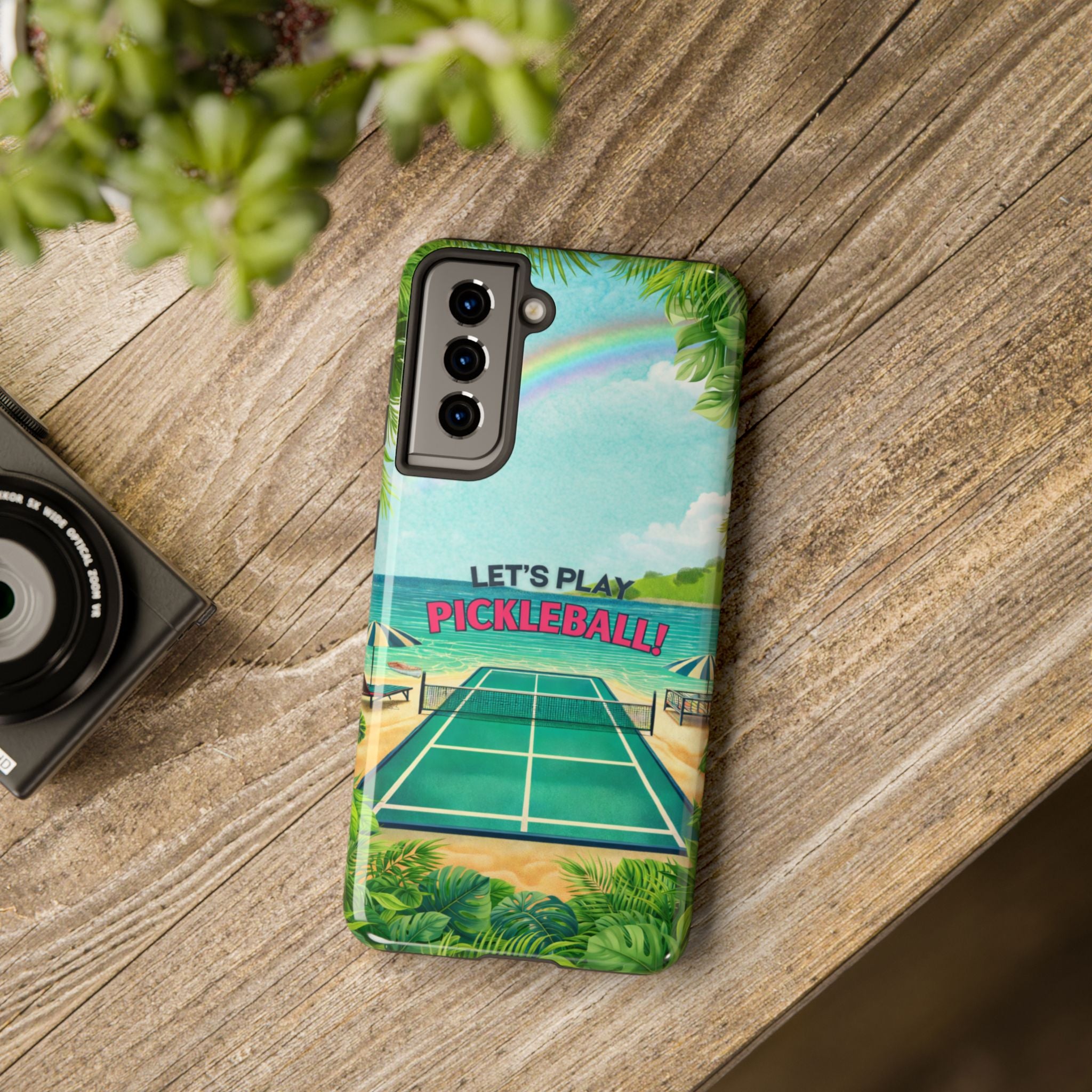 Let's Play Pickleball tropical tough phone case by Printify featuring a beach court design for iPhone and Android devices.
