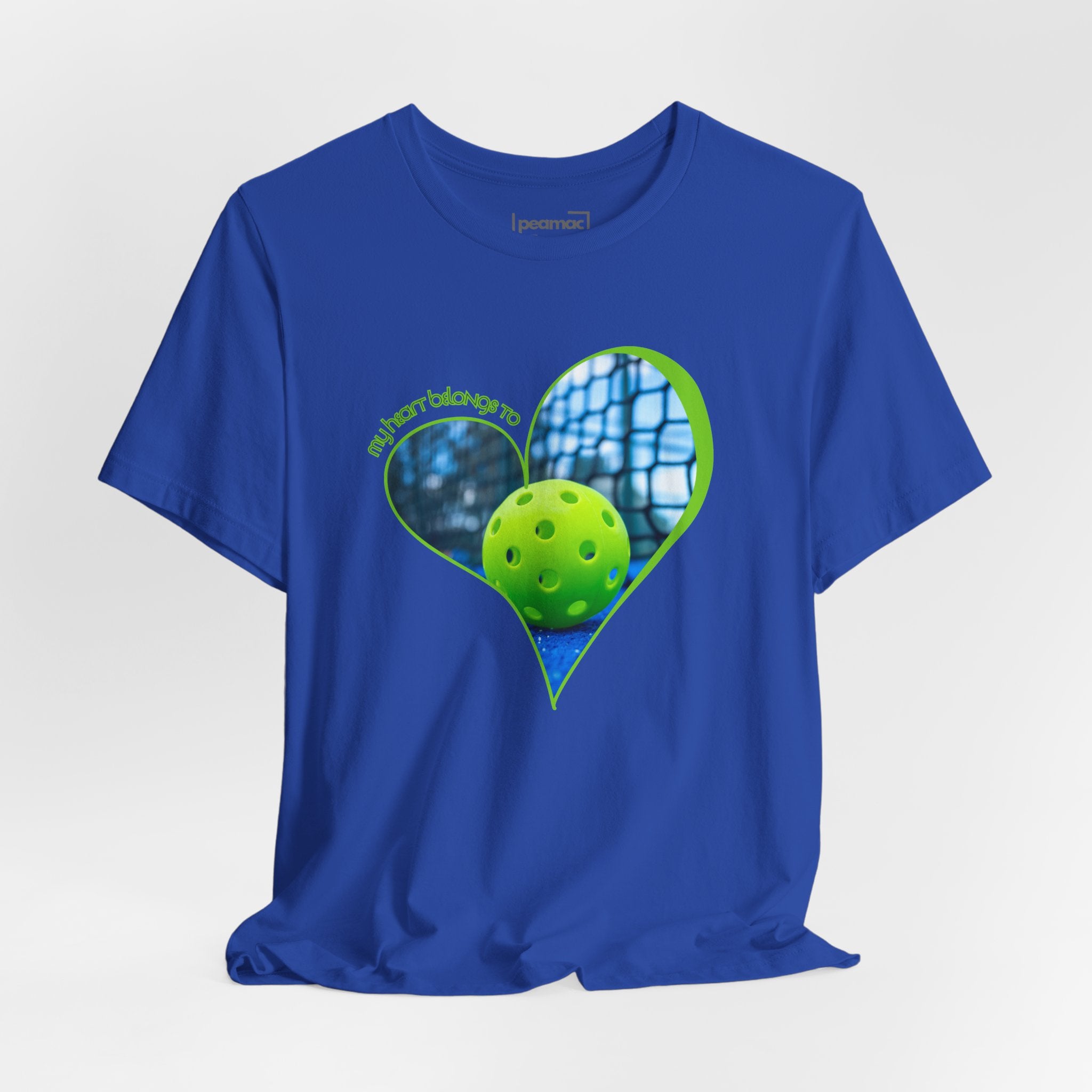 Pink pickleball T-shirt with "My Heart Belongs to Pickleball" slogan, designed for players and fans, by Printify.