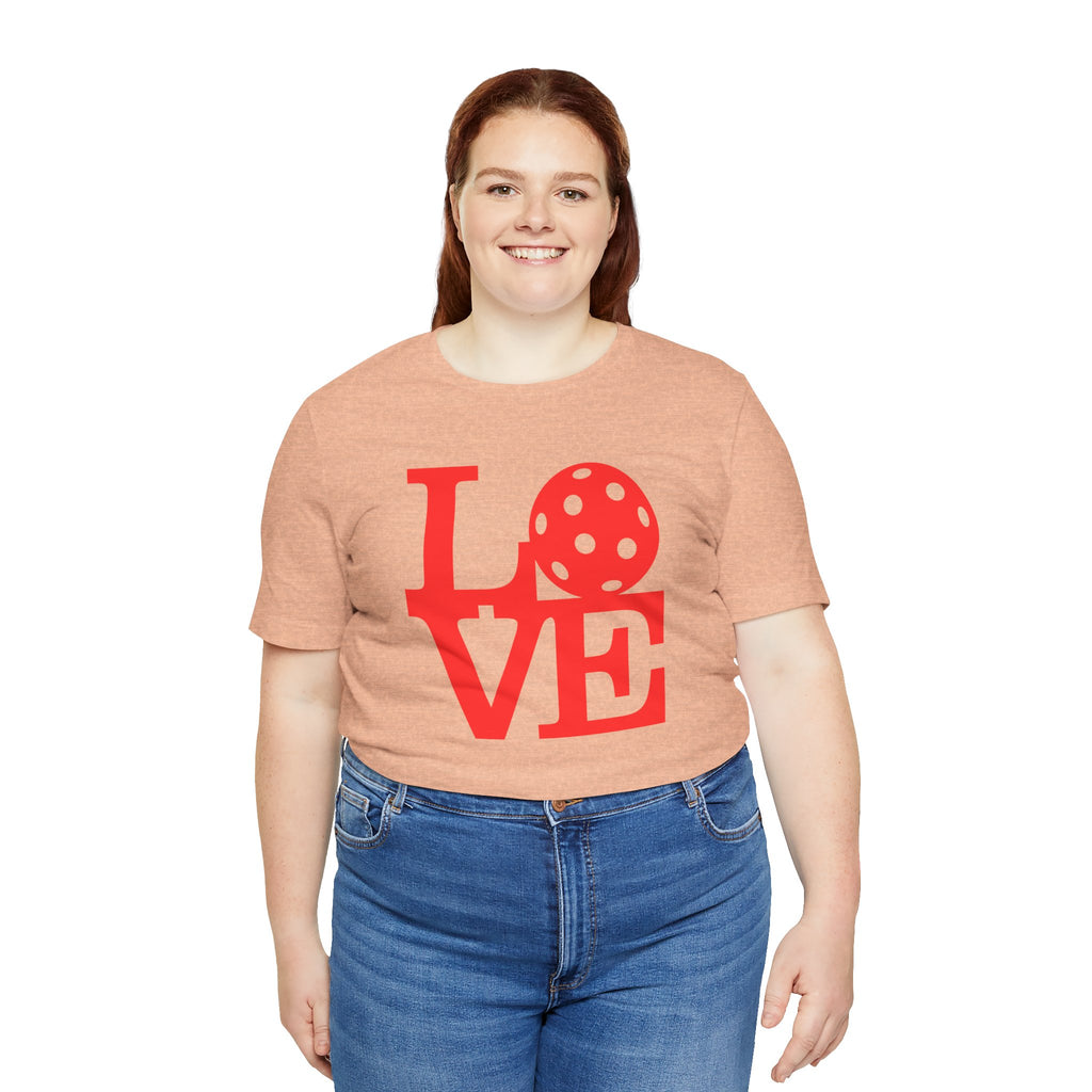 Red LOVE Pickleball graphic T-shirt by Printify featuring bold pop art style, casual fit, perfect for pickleball enthusiasts.