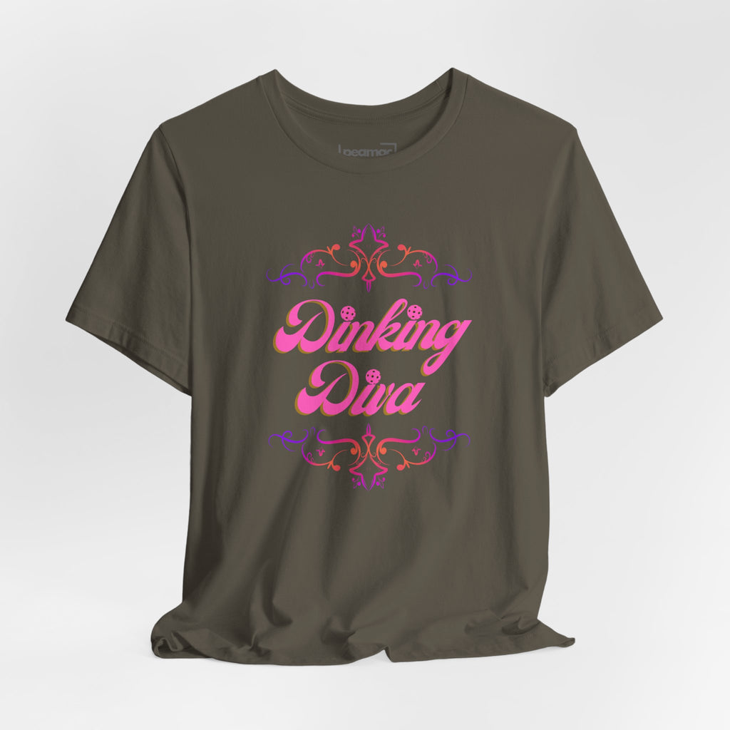 Pink Dinking Diva pickleball T-shirt with filigree design, athletic fit, and printed logo, ideal for active pickleball players.