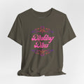 Pink Dinking Diva pickleball T-shirt with filigree design, athletic fit, and printed logo, ideal for active pickleball players.