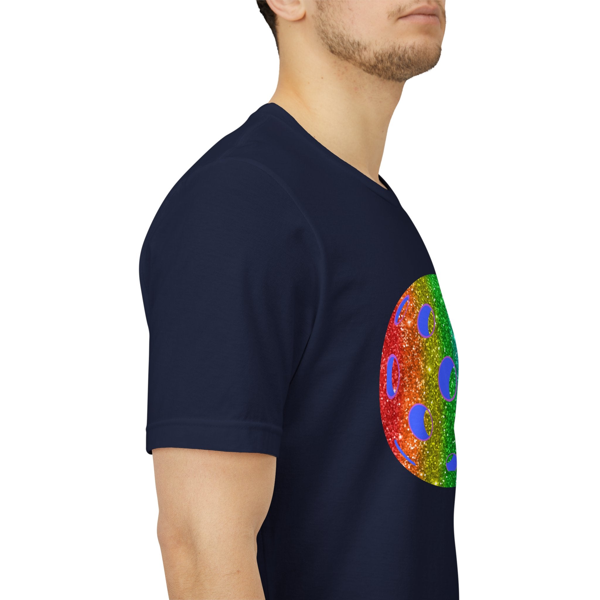 Rainbow glitter pickleball pride T-shirt from Printify featuring colorful sparkle design and bold "Loud and Proud" slogan.