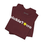 Toronto PickleTOwn T-Shirt featuring CN Tower and pickleball design, casual unisex tee by Printify