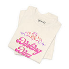 Pink Dinking Diva pickleball T-shirt with filigree design, athletic fit, and Printify branding displayed on the front.