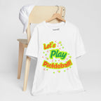 Neon orange and electric green pickleball rally T-shirt with court graphic, casual printify brand tee for activewear.