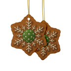 Decorative pickleball-themed Christmas ornaments in gingerbread style, featuring four festive holiday shapes for home decor.