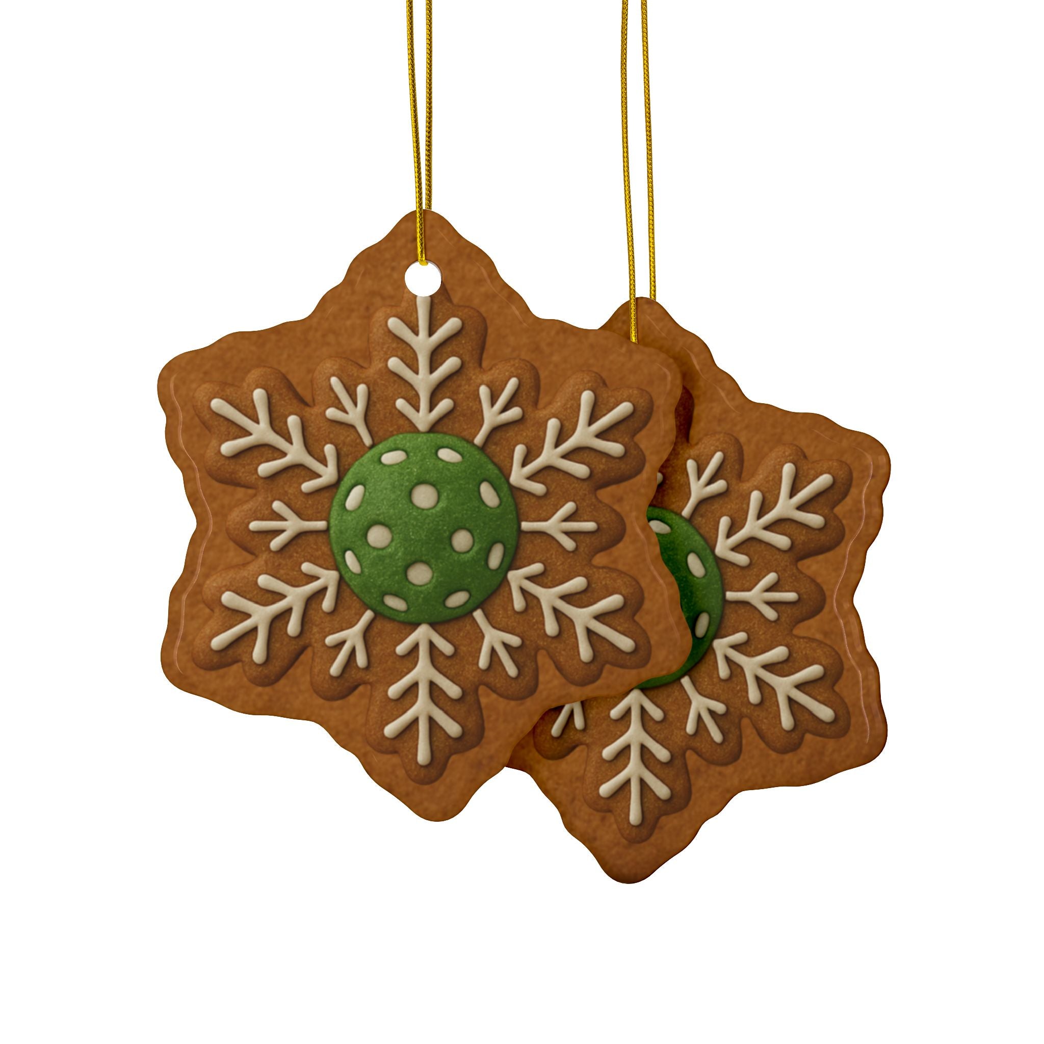 Decorative pickleball-themed Christmas ornaments in gingerbread style, featuring four festive holiday shapes for home decor.