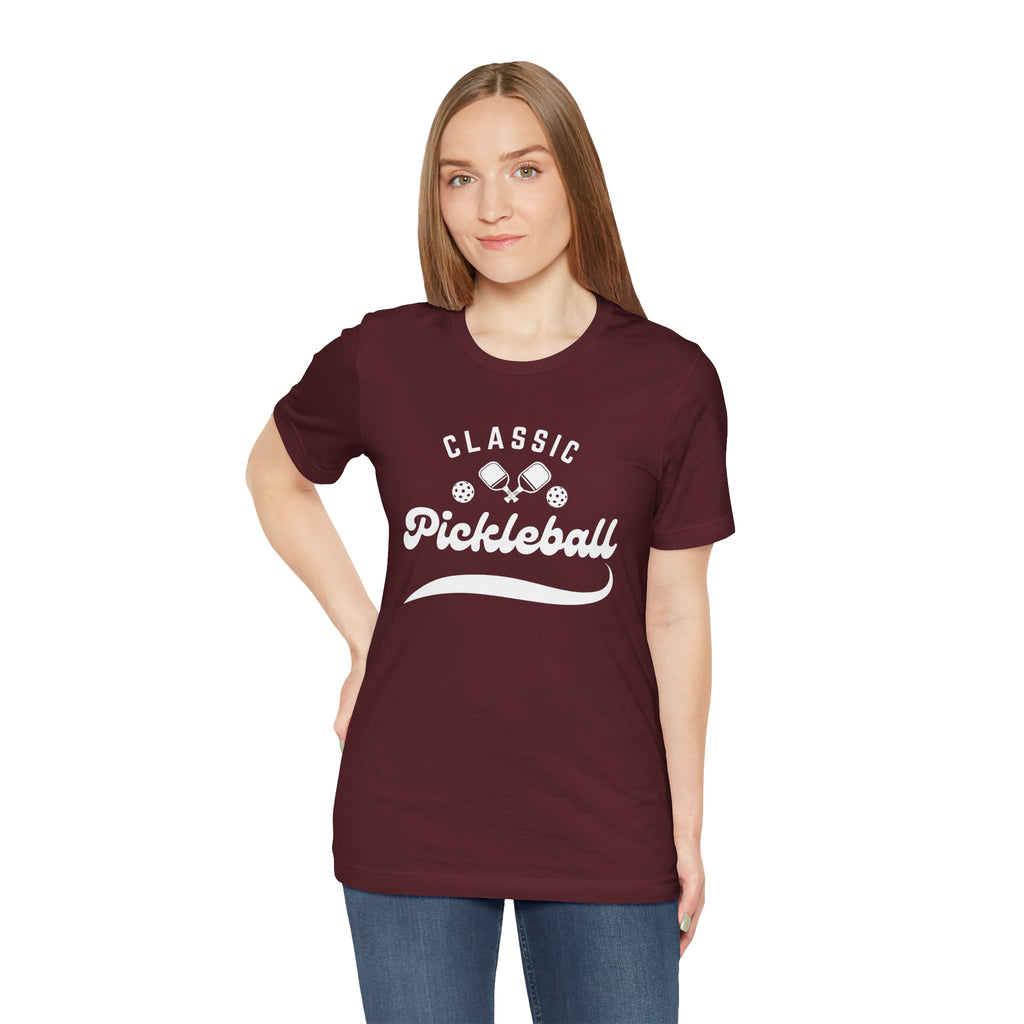 Classic pickleball T-shirt with "Pickleball" script design, comfortable cotton fabric, perfect for pickleball players and fans.