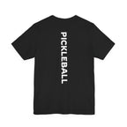 Women's retro-inspired pickleball T-shirt with vertical 'PICKLEBALL' back print, casual athletic wear by Printify.