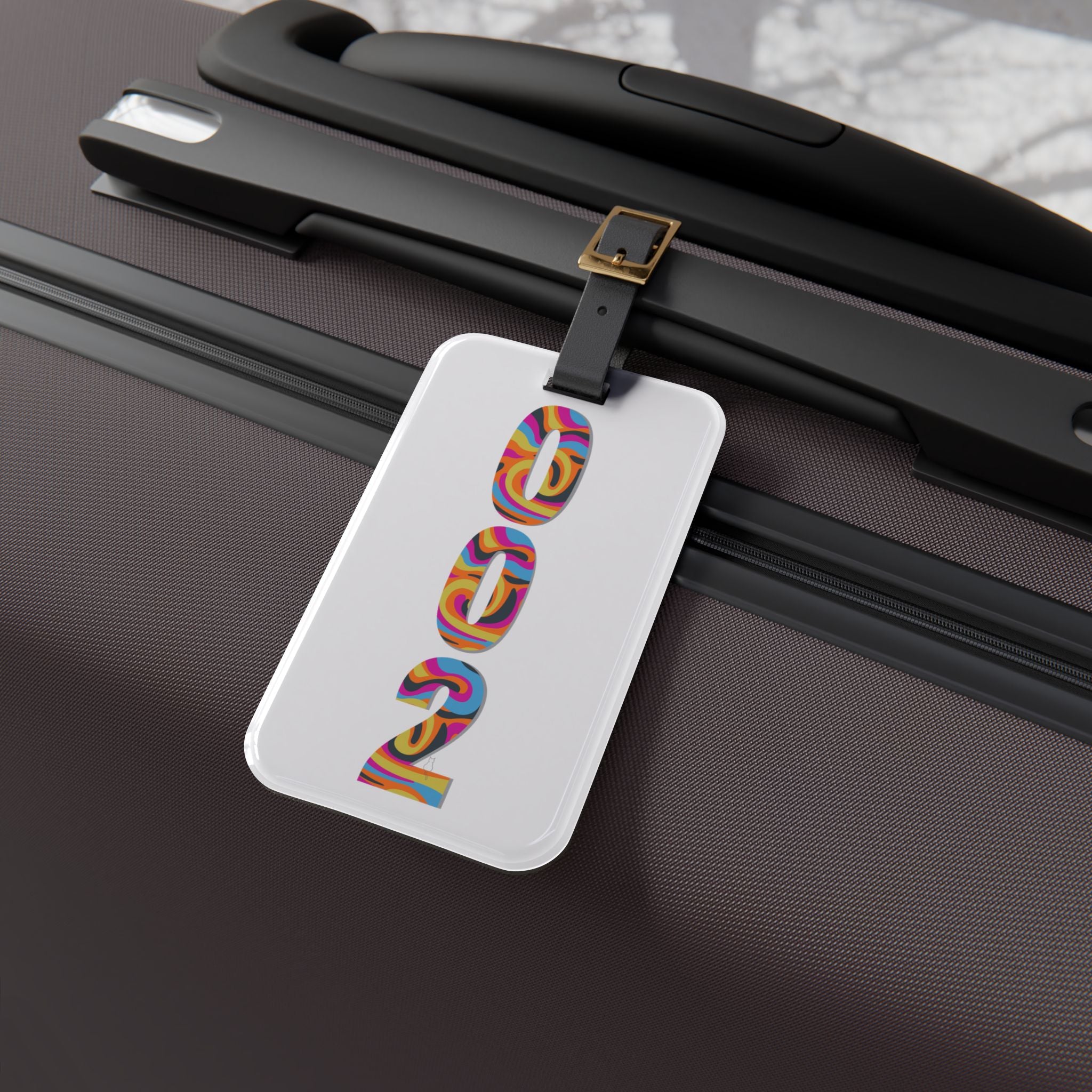 Pickleball luggage tag with retro numbers design, PeaMac Tees accessory, featuring vibrant colors and clear branding.