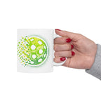 Green Pixelated Pickleball ceramic mug with retro exploding pickleball design, 11oz or 15oz, by Printify