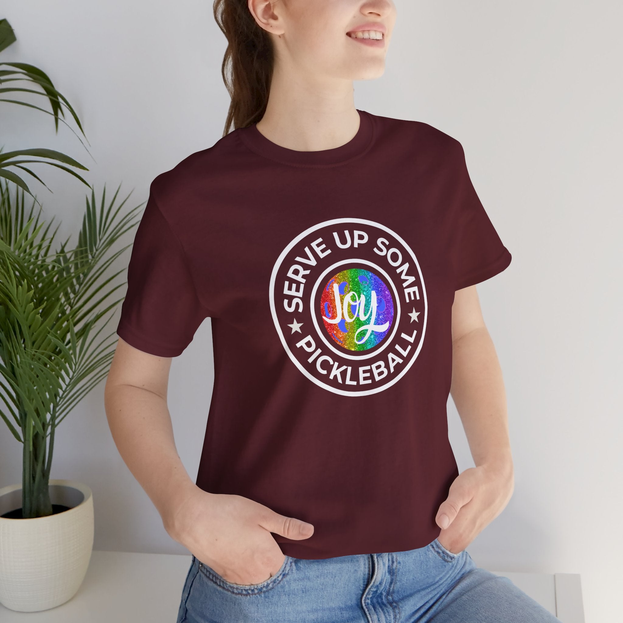 LGBTQ2 pride T-shirt featuring colorful pickleball graphics, comfortable fit, and bold pride-themed design by Printify.